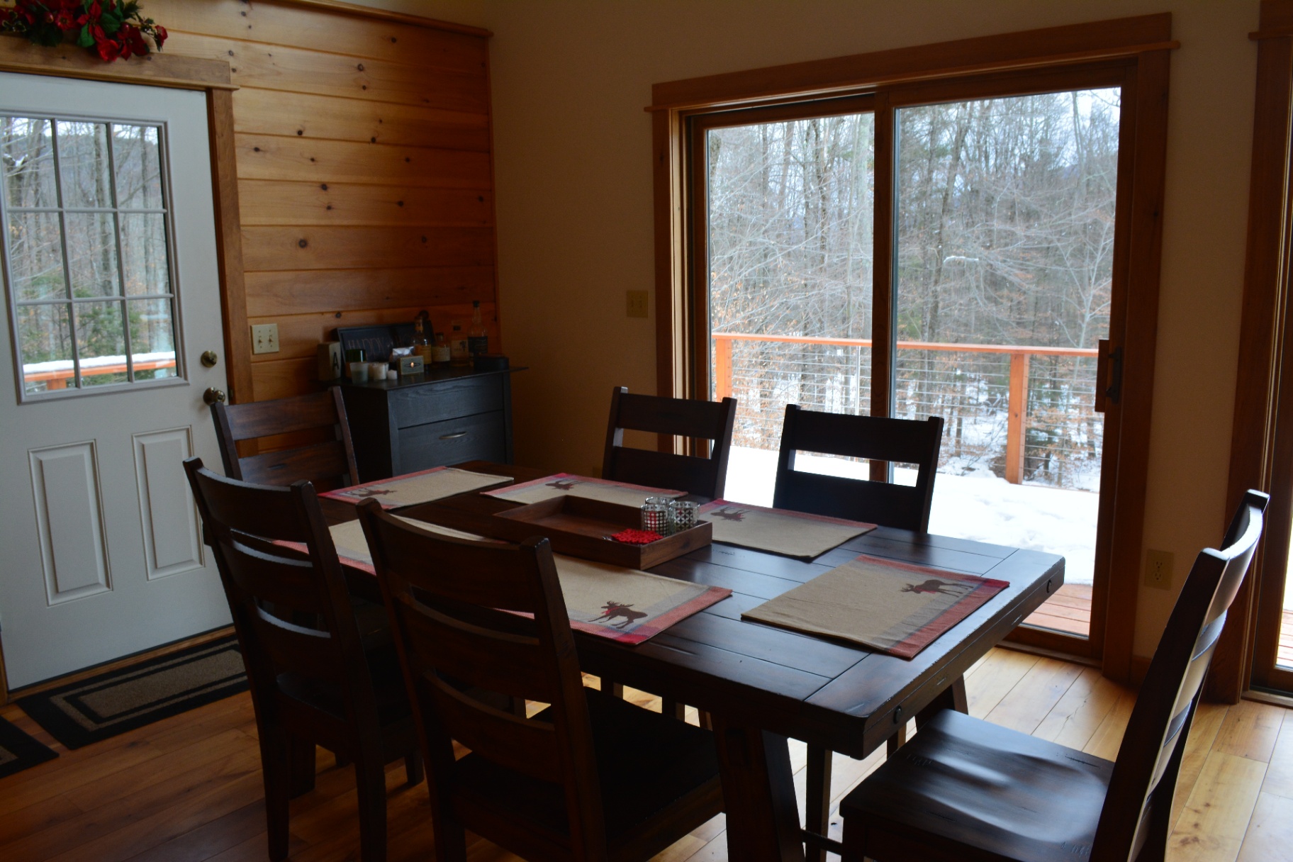 Dining table for six with deck views