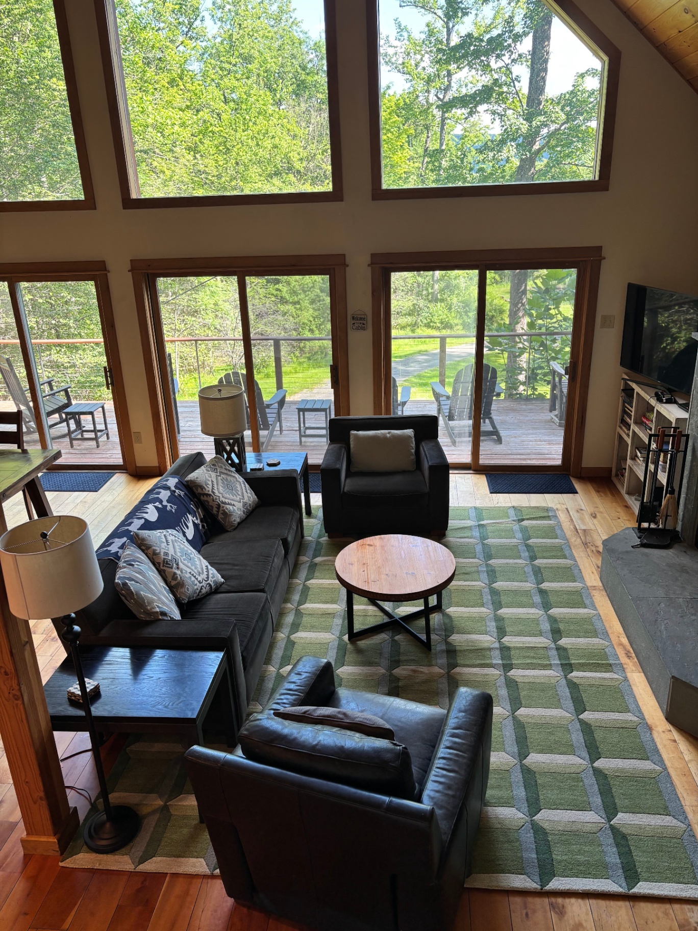 Wide view of the living room and deck doors