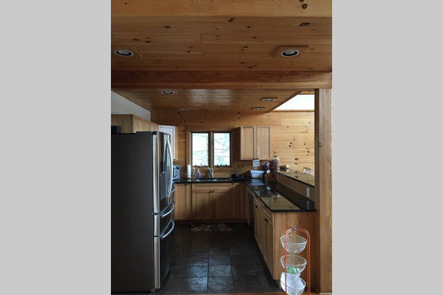 Kitchen with vaulted pine ceiling
