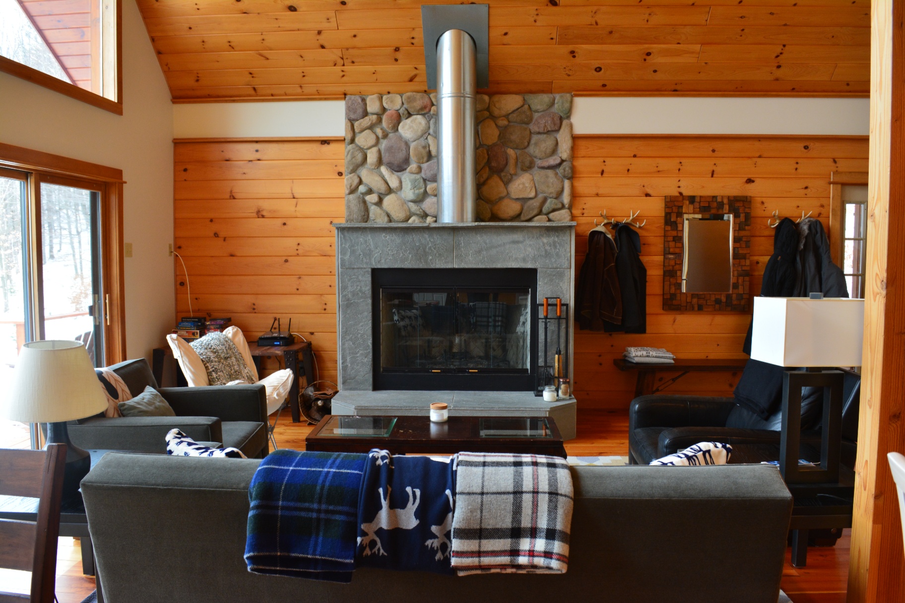 River-stone fireplace and vaulted pine ceiling